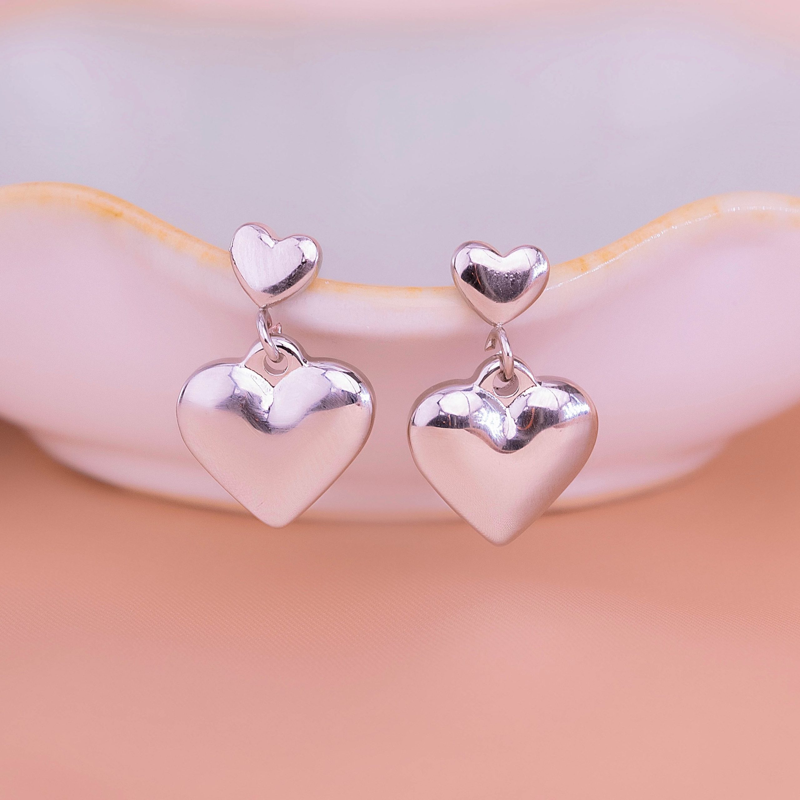 Aretes Corazones Plateados