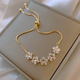 Pulsera Flores Estrellas Dorada