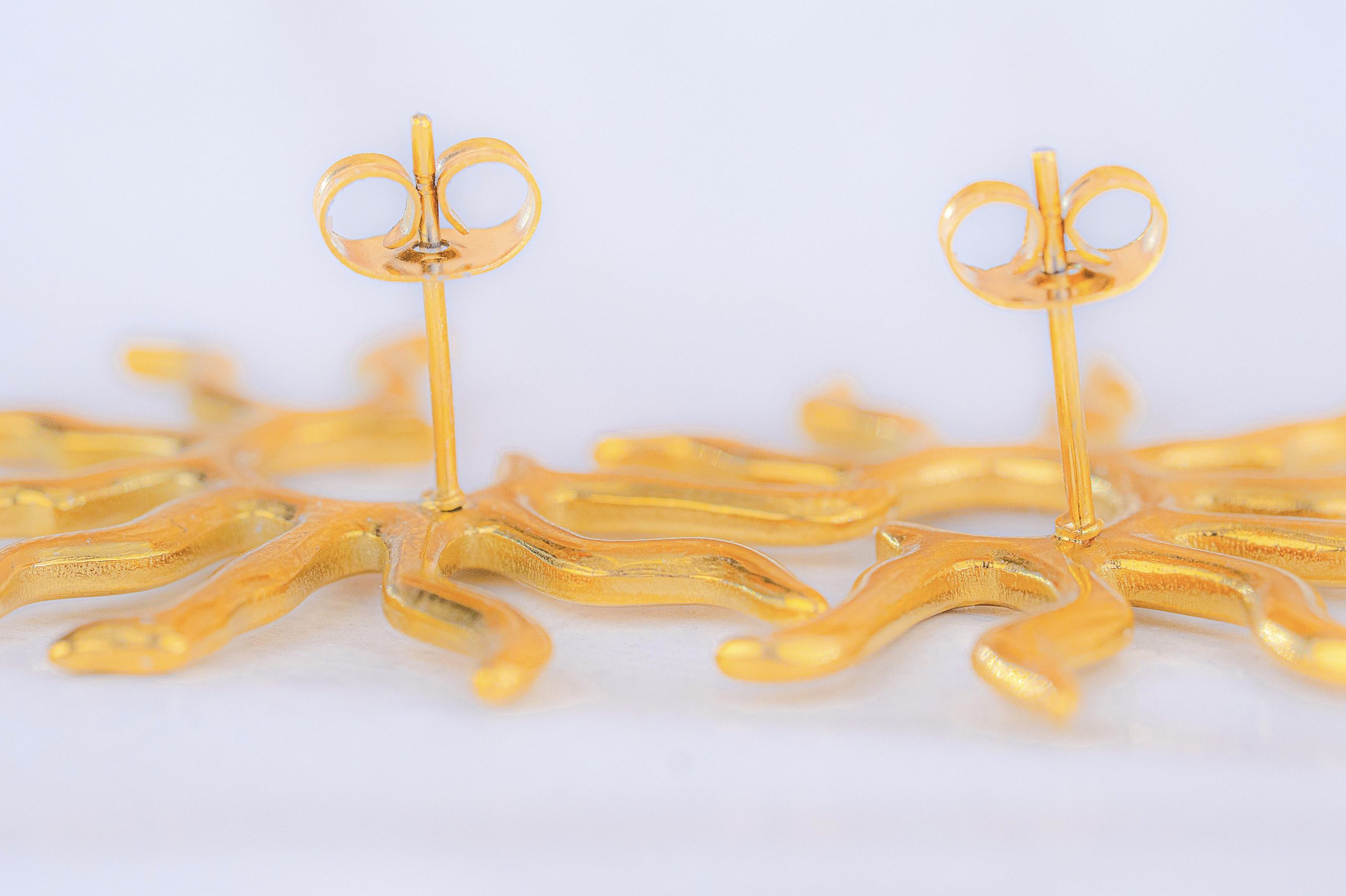 Aretes Soles Dorados