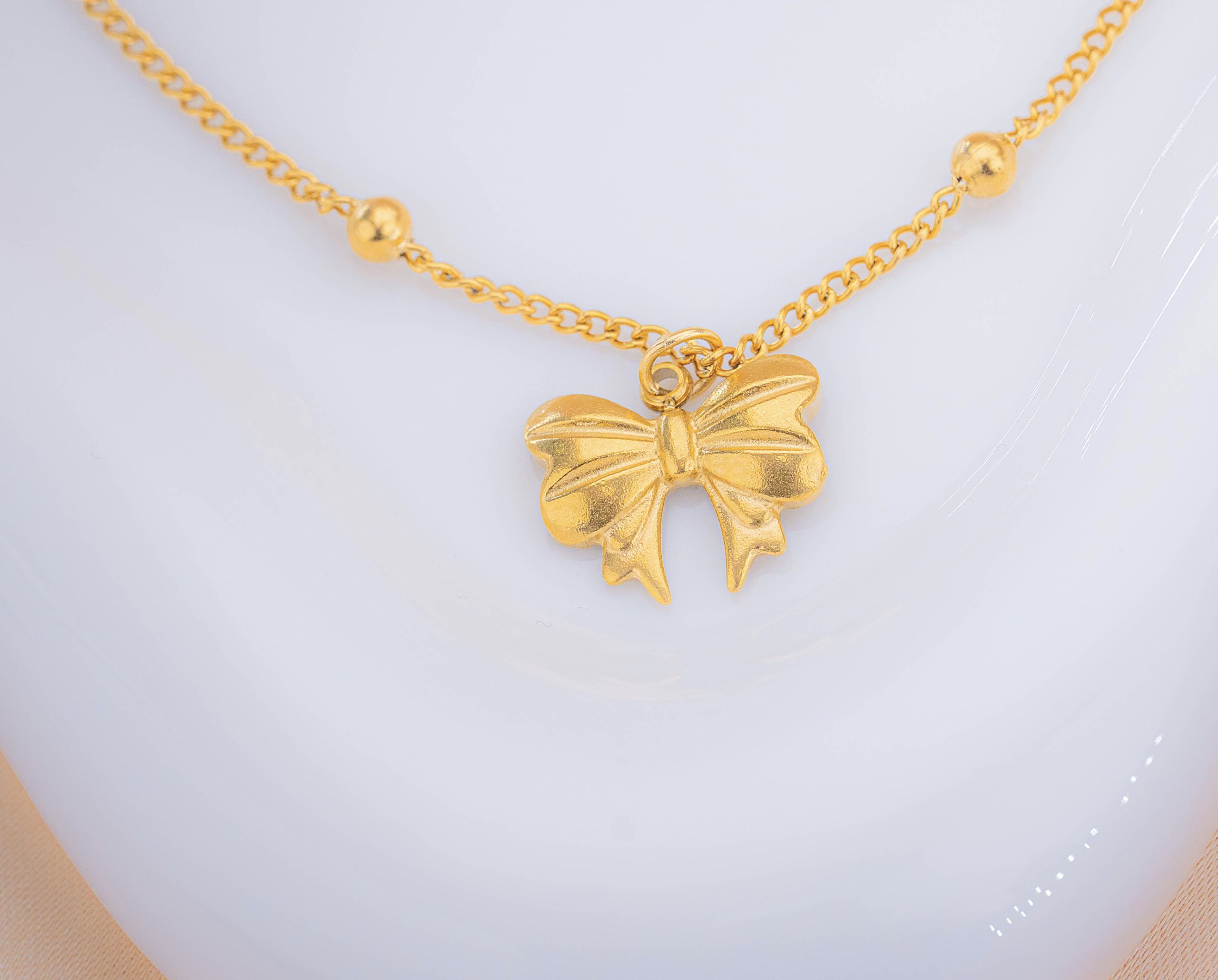 Cadenita Moño Dorada