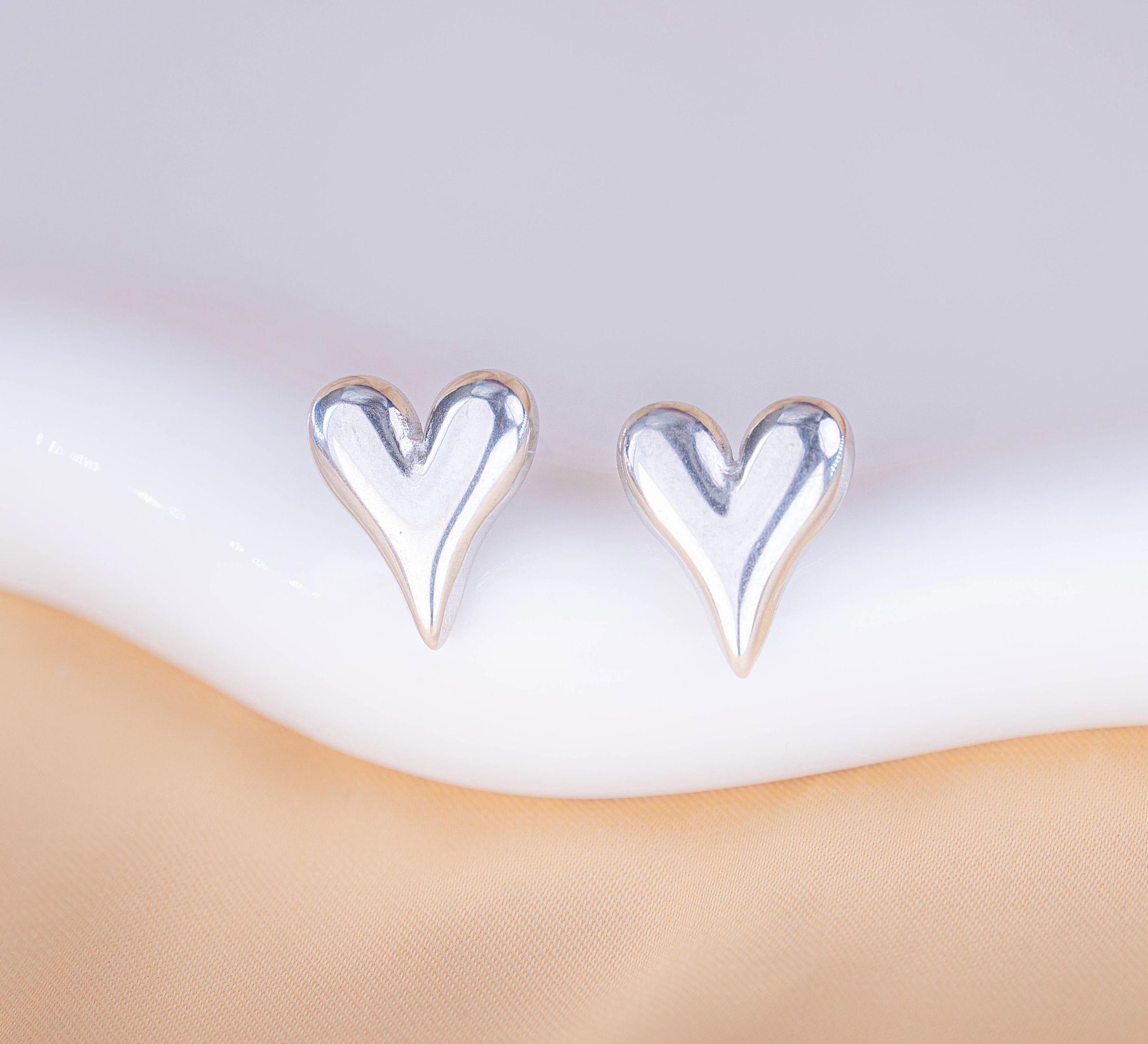 Topos Corazones Plateados